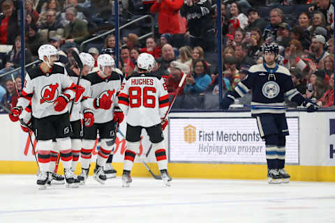 Dec 16, 2023; Columbus, Ohio, USA; New Jersey Devils center Jack Hughes (86) celebrates a goal with teammates during the first period against the Columbus Blue Jackets at Nationwide Arena. Mandatory Credit: Joseph Maiorana-USA TODAY Sports