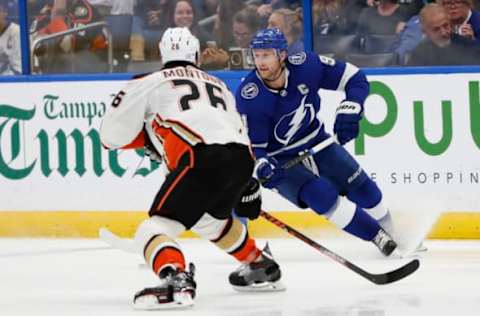 TAMPA, FL – NOVEMBER 27: Tampa Bay Lightning center Steven Stamkos (91) is defended by Anaheim Ducks defenseman Brandon Montour (26) in the second period of the regular season NHL game between the Anaheim Ducks and Tampa Bay Lightning on November 27, 2018 at Amalie Arena in Tampa, FL. (Photo by Mark LoMoglio/Icon Sportswire via Getty Images)