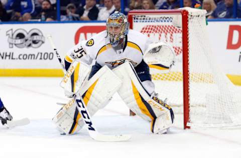 NHL Power Rankings: Nashville Predators goalie Pekka Rinne (35) defends during the first period at Amalie Arena. Mandatory Credit: Kim Klement-USA TODAY Sports