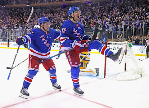 NEW YORK, NEW YORK – MAY 11: Frank Vatrano #77 and Filip Chytil #72 of the New York Rangers celebrate Chytil’s third period goal against the Pittsburgh Penguins in Game Five of the First Round of the 2022 Stanley Cup Playoffs at Madison Square Garden on May 11, 2022 in New York City. The Rangers defeated the Penguins 5-3. (Photo by Bruce Bennett/Getty Images)