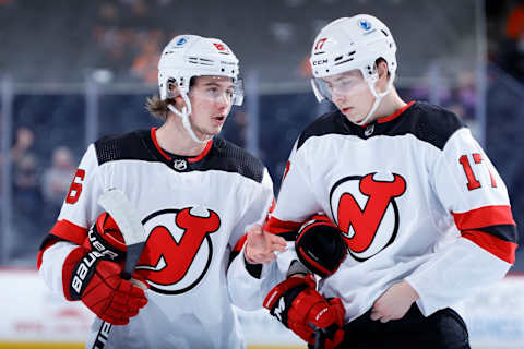 Jack Hughes #86 and Yegor Sharangovich #17 of the New Jersey Devils. (Photo by Tim Nwachukwu/Getty Images)