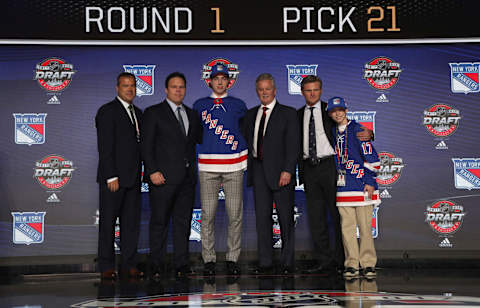 CHICAGO, IL – JUNE 23: (L-R) Head coach Alain Vigneault, general manager Jeff Gorton, 21st overall pick Filip Chytil, director of player personnel Gordie Clark, director of European scouting Nick Bobrov and the draft runner of the New York Rangers pose for a photo onstage during Round One of the 2017 NHL Draft at United Center on June 23, 2017 in Chicago, Illinois. (Photo by Dave Sandford/NHLI via Getty Images)