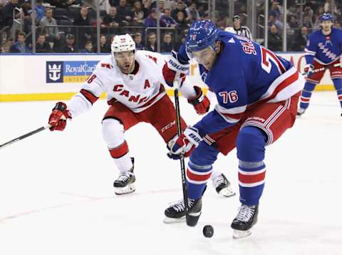 Brady Skjei #76 of the New York Rangers skates against the Carolina Hurricanes