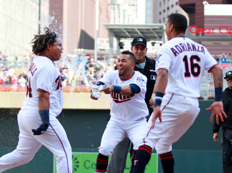 MINNEAPOLIS, MN – SEPTEMBER 9: Minnesota Twins’ Willians Astudillo (L) is doused with water by Twins’ Eddie Rosario after Astudillo hit a walk-off two-run homer in the ninth inning off Kansas City Royals pitcher Jason Hammel during their baseball game on September 9, 2018, at Target Field in Minneapolis, Minnesota. The Twins defeated the Royals 3-1. (Photo by Andy King/Getty Images)