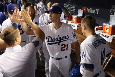 LOS ANGELES, CA – OCTOBER 26: Walker Buehhler #21 of the Los Angeles Dodgers is congratulated in the dugout during Game 3 of the 2018 World Series against the Boston Red Sox at Dodger Stadium on Friday, October 26, 2018 in Los Angeles, California. (Photo by Rob Tringali/MLB Photos via Getty Images)