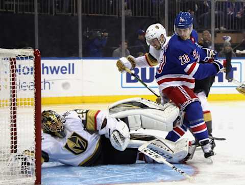 Chris Kreider #20 of the New York Rangers misses an attempt against Marc-Andre Fleury #29 of the Vegas Golden Knights . (Photo by Bruce Bennett/Getty Images)