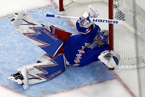 May 9, 2017; New York, NY, USA; New York Rangers goalie Henrik Lundqvist (30) makes a save against the Ottawa Senators during the first period in game six of the second round of the 2017 Stanley Cup Playoffs at Madison Square Garden. Mandatory Credit: Adam Hunger-USA TODAY Sports.