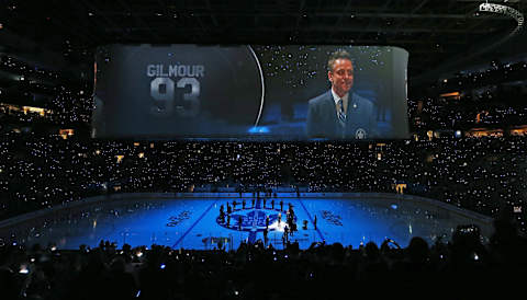 TORONTO, ON – OCTOBER 15: Retired Maple Leaf legend Doug Glimour watches as his #93 is formally retired and raised to the rafters prior to action between the Toronto Maple Leafs . (Photo by Claus Andersen/Getty Images)