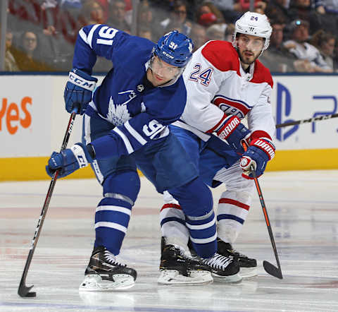 TORONTO, ON – FEBRUARY 23: Phillip Danault #24 of the Montreal Canadiens keeps a close check on John Tavares #91 of the Toronto Maple Leafs in an NHL game at Scotiabank Arena on February 23, 2019 in Toronto, Ontario, Canada. The Maple Leafs defeated the Canadiens 6-3. (Photo by Claus Andersen/Getty Images)