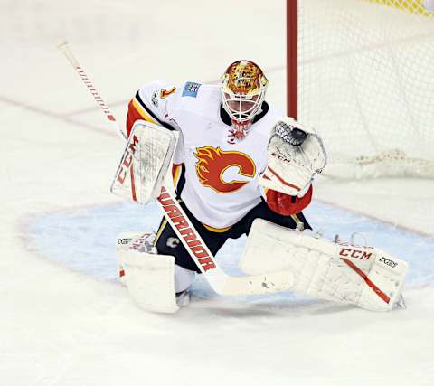 Mar 11, 2017; Winnipeg, Manitoba, CAN; Calgary Flames goalie Brian Elliott (1) makes a glove save during the second period against the Winnipeg Jets at MTS Centre. Mandatory Credit: Bruce Fedyck-USA TODAY Sports