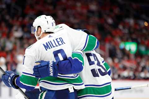 Jan 16, 2022; Washington, District of Columbia, USA; Vancouver Canucks center Bo Horvat (53) celebrates with Canucks center J.T. Miller (9) after scoring a goal against the Washington Capitals during the second period at Capital One Arena. Mandatory Credit: Geoff Burke-USA TODAY Sports