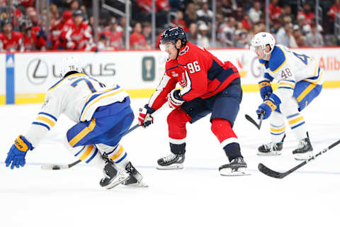 Sep 24, 2023; Washington, District of Columbia, USA; Washington Capitals forward Nicolas Aube-Kubel (96) controls the puck as Buffalo Sabres defenseman Jacob Bryson (78) defends during the third period at Capital One Arena. Mandatory Credit: Amber Searls-USA TODAY Sports