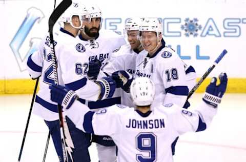 Nov 7, 2016; Sunrise, FL, USA; Tampa Bay Lightning left wing Ondrej Palat (18) celebrates his goal against the Florida Panthers with center Brayden Point (21) defenseman Andrej Sustr (62) defenseman Jason Garrison (5) and center Tyler Johnson (9) in the third period at BB&T Center. The Panthers won 3-1. Mandatory Credit: Robert Mayer-USA TODAY Sports