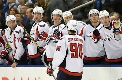 NHL Power Rankings: Washington Capitals forward Marcus Johansson (90) is congratulated by team mates after scorinig against Toronto Maple Leafs in a 4-2 loss at Air Canada Centre. Mandatory Credit: Dan Hamilton-USA TODAY Sports