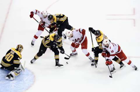 The Carolina Hurricanes skates against the Boston Bruins (Photo by Elsa/Getty Images)