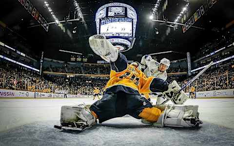 NASHVILLE, TN – JANUARY 23: Chris Kunitz #14 of the Tampa Bay Lightning shoots wide of the net against a sprawling Juuse Saros #74 of the Nashville Predators during an NHL game at Bridgestone Arena on January 23, 2018 in Nashville, Tennessee. (Photo by John Russell/NHLI via Getty Images)