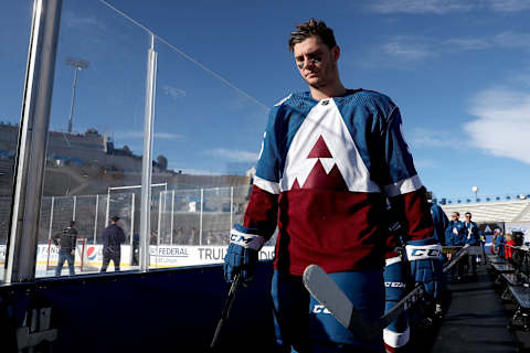 COLORADO SPRINGS, COLORADO – FEBRUARY 14: Andre Burakovsky #95 of the Colorado Avalanche walks to the ice for practice prior to the 2020 NHL Stadium Series game against the Los Angeles Kings at Falcon Stadium on February 14, 2020 in Colorado Springs, Colorado. (Photo by Matthew Stockman/Getty Images)