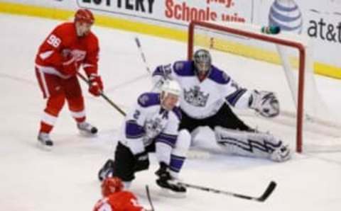 December 20, 2008; Detroit, MI, USA; Detroit Red Wings center Pavel Datsyuk (13) shoots the puck as Los Angeles Kings goalie Jonathan Quick (32) makes the save during the game at Joe Louis Arena. Mandatory Credit: Leon Halip-USA TODAY Sports