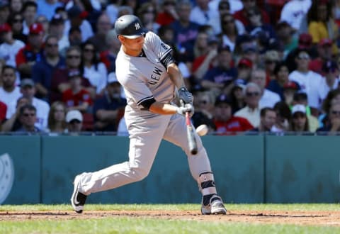 Sep 17, 2016; Boston, MA, USA; New York Yankees catcher Gary Sanchez (24) connects on a two-run home run against the Boston Red Sox during the third inning at Fenway Park. Mandatory Credit: Winslow Townson-USA TODAY Sports