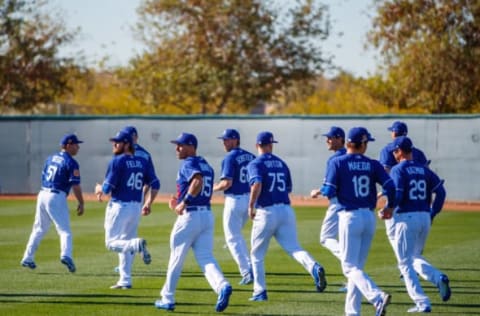 Feb 16, 2017; Glendale, AZ, USA; Los Angeles Dodgers players run drills during a Spring Training practice at Camelback Ranch. Mandatory Credit: Mark J. Rebilas-USA TODAY Sports