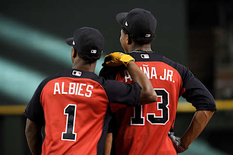 PHOENIX, AZ – SEPTEMBER 07: Ozzie Albies #1 and Ronald Acuna Jr. #13 of the Atlanta Braves looks on during batting practice for the MLB game against the Arizona Diamondbacks at Chase Field on September 7, 2018 in Phoenix, Arizona. (Photo by Jennifer Stewart/Getty Images)