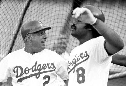 Tommy Lasorda #2 and Reggie Smith #8 of the Los Angeles Dodgers (Photo by Jayne Kamin-Oncea/Getty Images)