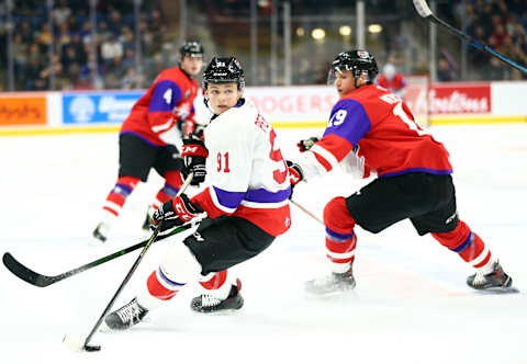 Mercer Dawson #19, Cole Perfetti #91 (Photo by Vaughn Ridley/Getty Images)