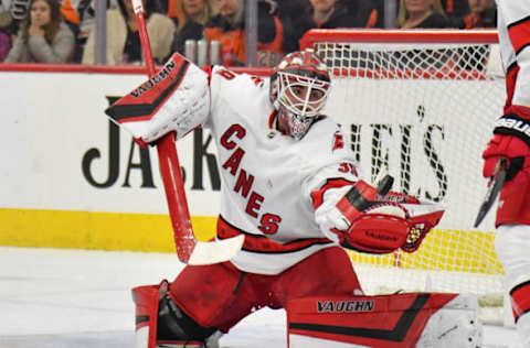 Mar 5, 2020; Philadelphia, Pennsylvania, USA; Carolina Hurricanes goaltender Alex Nedeljkovic (39) makes a glove save against the Philadelphia Flyers during the second period at Wells Fargo Center. Mandatory Credit: Eric Hartline-USA TODAY Sports