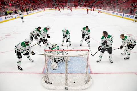 DETROIT, MI – JANUARY 16: The Dallas Stars surround teammate goaltender Kari Lehtonen #32 during warm-ups prior to an NHL game against the Detroit Red Wings at Little Caesars Arena on January 16, 2018 in Detroit, Michigan. (Photo by Jennifer Hefner/NHLI via Getty Images)