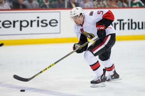 Mar 31, 2016; Saint Paul, MN, USA; Ottawa Senators defenseman Cody Ceci (5) skates with the puck in the third period against the Minnesota Wild at Xcel Energy Center. the Ottawa Senators beat the Minnesota Wild 3-2. Mandatory Credit: Brad Rempel-USA TODAY Sports