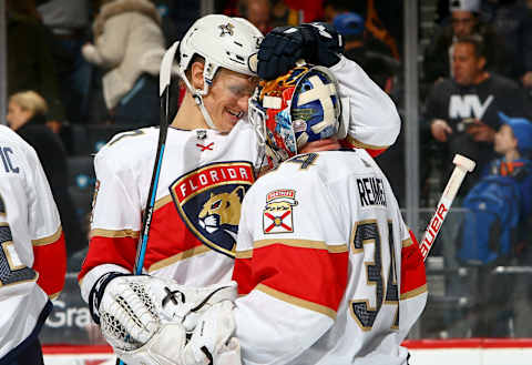 NEW YORK, NY – MARCH 26: Nick Bjugstad #27 of the Florida Panthers congratulates teammate James Reimer #34 on his shutout following a 3-0 victory over the New York Islanders at Barclays Center on March 26, 2018 in New York City. (Photo by Mike Stobe/NHLI via Getty Images)