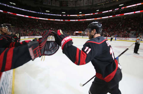 RALEIGH, NC – MARCH 16: Jordan Staal #11 of the Carolina Hurricanes scores his 500th point during an NHL game against the Buffalo Sabres on March 16, 2019 at PNC Arena in Raleigh, North Carolina. (Photo by Gregg Forwerck/NHLI via Getty Images)