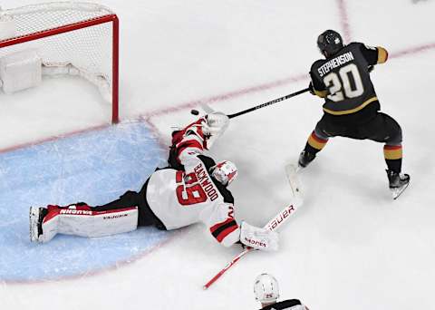 Chandler Stephenson #20 of the Vegas Golden Knights hits the goalpost with a shot after deking around Mackenzie Blackwood #29 of the New Jersey Devils. (Photo by Ethan Miller/Getty Images)