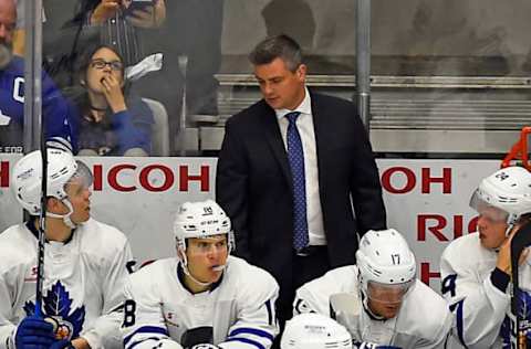 TORONTO, ON – OCTOBER 7: Head coach Sheldon Keefe has some instruction for Andrew Nielsen