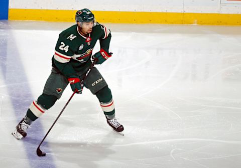 ST. PAUL, MN – NOVEMBER 15: Matt Dumba #24 of the Minnesota Wild controls the puck during a game with the Vancouver Canucks at Xcel Energy Center on November 15, 2018 in St. Paul, Minnesota.(Photo by Bruce Kluckhohn/NHLI via Getty Images)