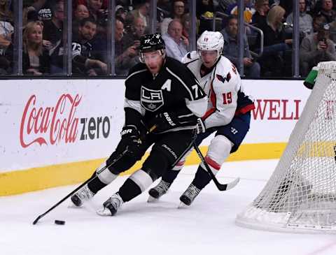 Mar 9, 2016; Los Angeles, CA, USA; Los Angeles Kings center Jeff Carter (77) is defended by Washington Capitals center Nicklas Backstrom (19) during an NHL game at Staples Center. Mandatory Credit: Kirby Lee-USA TODAY Sports