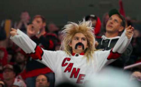 Oct 31, 2022; Raleigh, North Carolina, USA; Carolina Hurricanes fans celebrate against the Washington Capitals during the third period at PNC Arena. Mandatory Credit: James Guillory-USA TODAY Sports