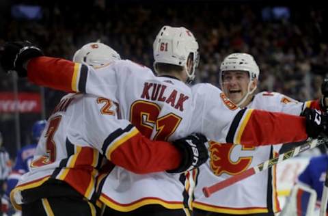 NEW YORK, NY – FEBRUARY 09: The Calgary Flames celebrate after a goal by Brett Kulak. (Photo by Abbie Parr/Getty Images)