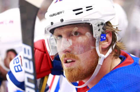 VANCOUVER, BC – MARCH 13: Marc Staal #18 of the New York Rangers looks on from the bench during their NHL game against the Vancouver Canucks at Rogers Arena March 13, 2019 in Vancouver, British Columbia, Canada. (Photo by Jeff Vinnick/NHLI via Getty Images)”n