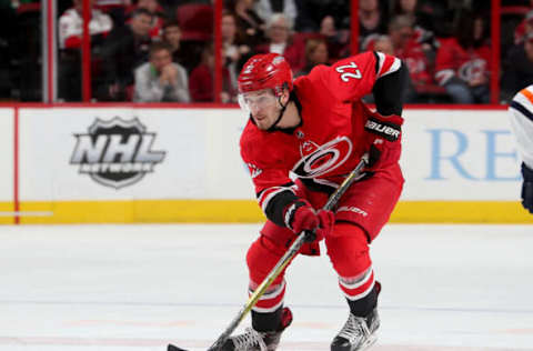 RALEIGH, NC – MARCH 20: Brett Pesce #22 of the Carolina Hurricanes skates with the puck during an NHL game game against the Edmonton Oilers on March 20, 2018 at PNC Arena in Raleigh, North Carolina. (Photo by Gregg Forwerck/NHLI via Getty Images)