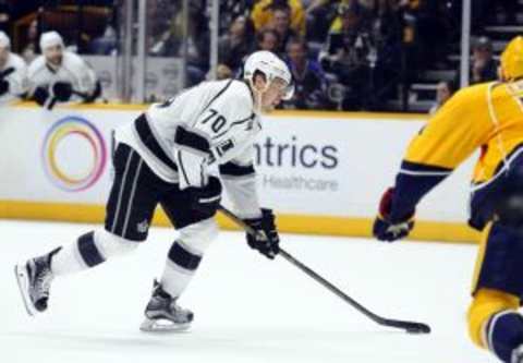 Feb 20, 2016; Nashville, TN, USA; Los Angeles Kings left winger Tanner Pearson (70) shoots the game-winning goal in overtime against the Nashville Predators at Bridgestone Arena. The Kings won 2-1 in overtime. Mandatory Credit: Christopher Hanewinckel-USA TODAY Sports