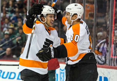 Jan 7, 2016; Saint Paul, MN, USA; Philadelphia Flyers defenseman Michael Del Zotto (15) celebrates his goal with forward Brayden Schenn (10) during the second period against the Minnesota Wild at Xcel Energy Center. Mandatory Credit: Brace Hemmelgarn-USA TODAY Sports