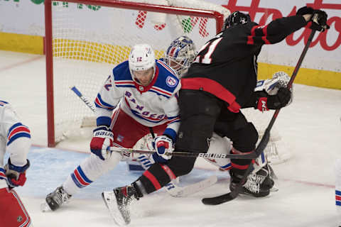 Feb 20, 2022; Ottawa, Ontario, CAN; Ottawa Senators left wing nick Paul (21) shoots on New York Rangers goalie Igor Shesterkin (31) in the third period at the Canadian Tire Centre. Mandatory Credit: Marc DesRosiers-USA TODAY Sports