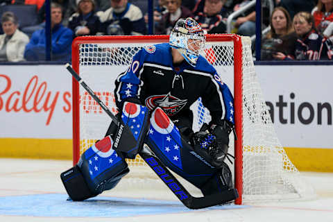 Dec 9, 2022; Columbus, Ohio, USA; Columbus Blue Jackets goaltender Elvis Merzlikins (90) follows the puck in play against the Calgary Flames in the second period at Nationwide Arena. Mandatory Credit: Aaron Doster-USA TODAY Sports