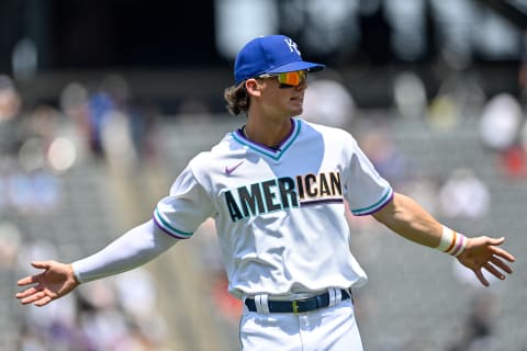 DENVER, CO – JULY 11: Bobby Witt Jr. #7 of American League Futures Team stretches before a game against the National League Futures Team at Coors Field on July 11, 2021 in Denver, Colorado.(Photo by Dustin Bradford/Getty Images)