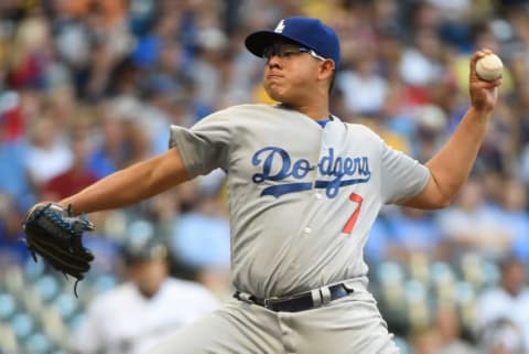 Jun 28, 2016; Milwaukee, WI, USA; Los Angeles Dodgers pitcher Julio Urias (7) pitches in the first inning against the Milwaukee Brewers at Miller Park. Mandatory Credit: Benny Sieu-USA TODAY Sports