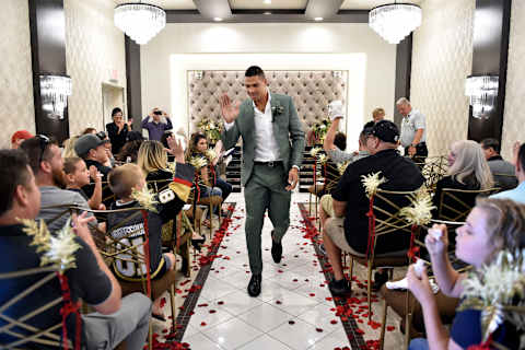 LAS VEGAS, NEVADA – SEPTEMBER 01: Ryan Reaves (C) of the Vegas Golden Knights gives high fives after performing a renewal of vows ceremony for Laura Long and Justin Long at Chapel of the Flowers on September 1, 2019 in Las Vegas, Nevada. The Long’s ceremony was the result of the couple winning a social media contest sponsored by the chapel. (Photo by David Becker/Getty Images)