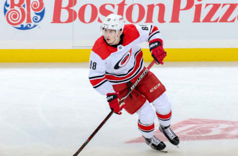 WINNIPEG, MB – OCTOBER 14: Martin Necas #88 of the Carolina Hurricanes keeps an eye on the play during third period action against the Winnipeg Jets at the Bell MTS Place on October 14, 2018 in Winnipeg, Manitoba, Canada. The Jets defeated the Canes 3-1. (Photo by Jonathan Kozub/NHLI via Getty Images)