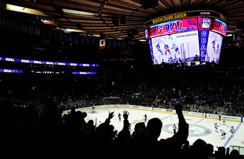 NEW YORK, NEW YORK – OCTOBER 12: Fans celebrate a first-period goal by Kaapo Kakko #24 of the New York Rangers, the first of his NHL career, during a game against the Edmonton Oilers at Madison Square Garden on October 12, 2019 in New York City. (Photo by Emilee Chinn/Getty Images)