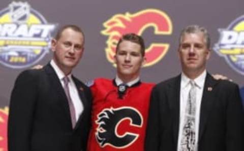 (EDITORS NOTE: caption correction) Jun 24, 2016; Buffalo, NY, USA; Matthew Tkachuk poses for a photo after being selected as the number six overall draft pick by the Calgary Flames in the first round of the 2016 NHL Draft at the First Niagra Center. Mandatory Credit: Timothy T. Ludwig-USA TODAY Sports